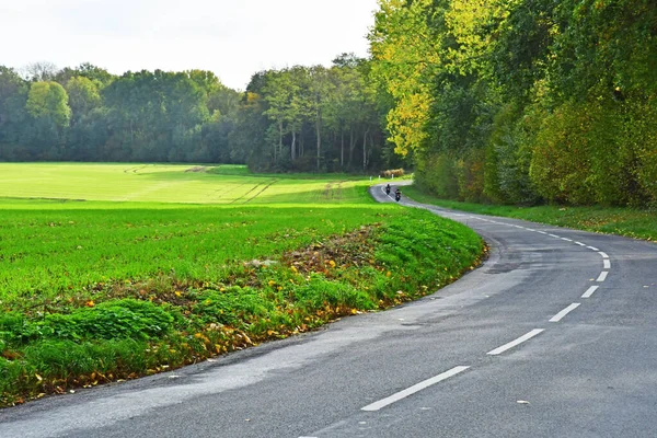 stock image  Chaussy; France - november 22 2022 : road and field in the countryside