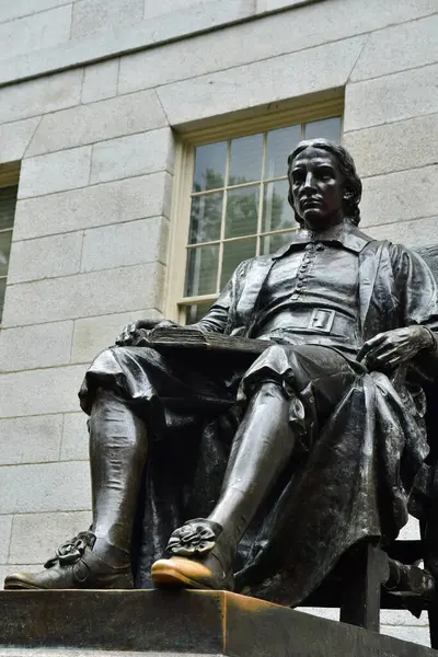 stock image Cambridge, USA - septembre 9 2023 : statue of John Harvard in the Harvard University