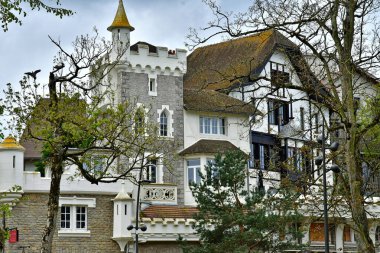 Le Touquet Paris Plage; France - april 20 2024 : the Swiss Village in the picturesque seaside city clipart