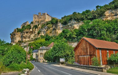 Beynac et Cazenac, France - august 18 2016 : the historical old castle built in the 12th century clipart