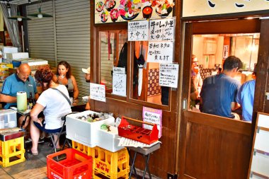 Kanazawa; Japan - august 22 2024 : restaurant in the Omicho Ishiba market clipart