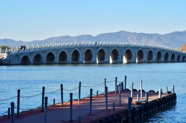 Beijingi; China - november 6 2024 : the Summer Palace, the seventeen arch bridge clipart