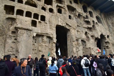 Luoyang; China - november 6 2024 : the Longmen Grottoes clipart