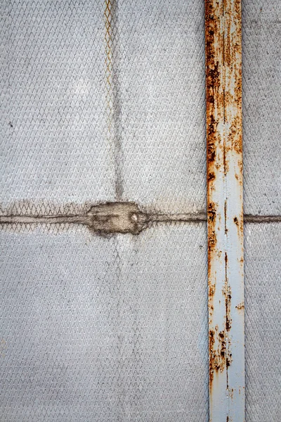 旧的裂纹的水泥墙上纹理的详细信息 — 图库照片