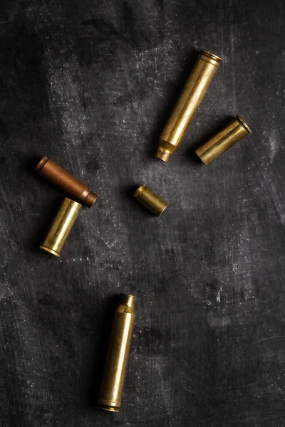 Empty Bullet Cartridges Lying Black Background — Fotografia de Stock