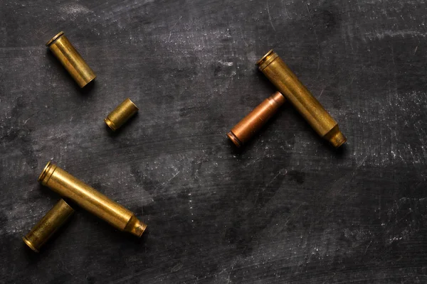 Empty Bullet Cartridges Lying Black Background — Stok fotoğraf