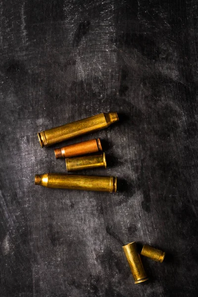 Empty Bullet Cartridges Lying Black Background — Stock Fotó