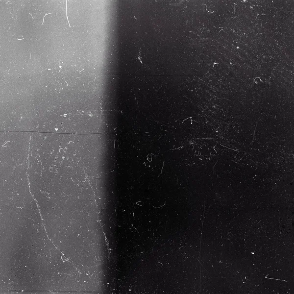 粒度の重いフィルムストリップのテクスチャの背景 ほこりや光漏れ — ストック写真