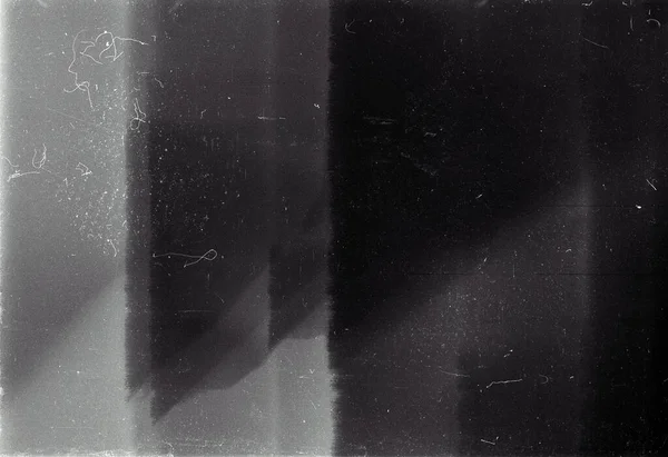 粒度の重いフィルムストリップのテクスチャの背景 ほこりや光漏れ — ストック写真
