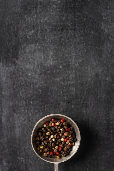 Big Old Spoon Peppercorn Black Background Flat Lay Top View — Stock Photo, Image