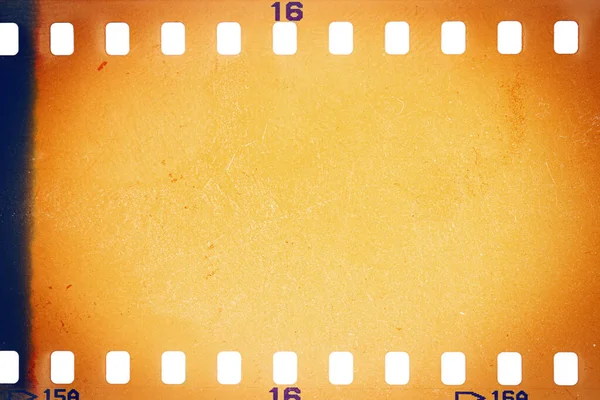 Dusty Grungy 35Mm Film Texture Surface Perforated Scratched Camera Film — Stock Photo, Image
