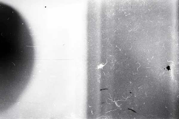 穀物やほこりの多い空粒フィルムストリップテクスチャの背景 ストック写真