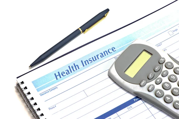 Registro Despesas Seguro Saúde Com Caneta Calculadora — Fotografia de Stock