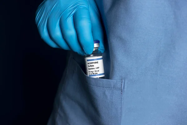 Gloved Hand Healthcare Worker Slips Morphine Vial Pocket Scrub Shirt — Stock Photo, Image
