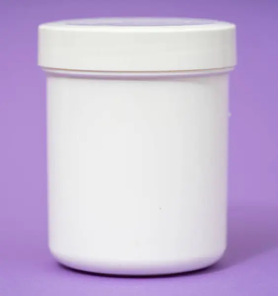 White plastic containers for medicines.