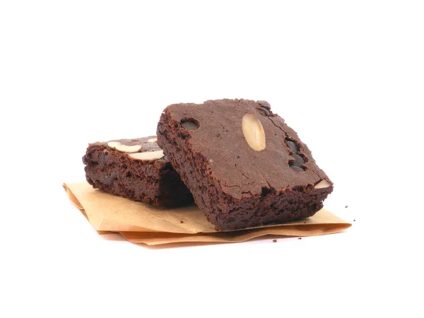 Brownies Auf Papier Isolierten Weißen Hintergrund Schokoladenbrownie Mit Mandelnussstücken Schokoladen — Stockfoto