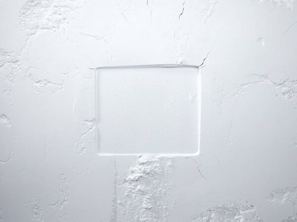 White flour texture background. Abstract powder texture. White powder surface with cracks and a square.