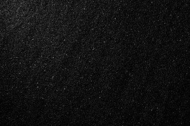 Top view black sand texture background. Dark Sand macro photography clipart