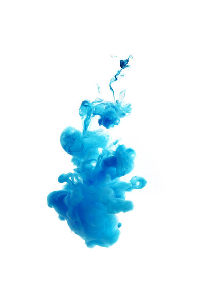 Blue ink dropped in to water isolated white background. Abstract color dissolving in water