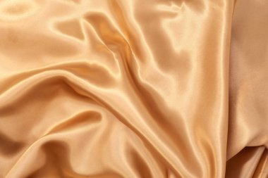 Arka plan için doğal altın kumaş dokusu. Lüks tuval arkaplanı.