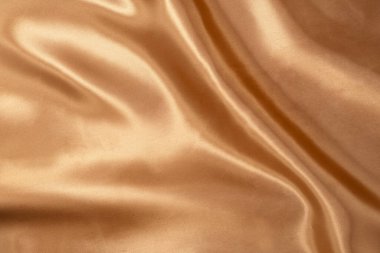 Arka plan için doğal altın kumaş dokusu. Lüks tuval arkaplanı.