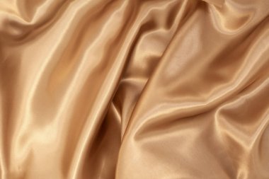 Arka plan için doğal altın kumaş dokusu. Lüks tuval arkaplanı.