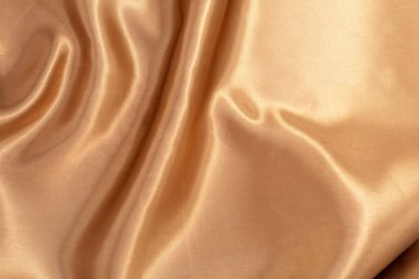 Arka plan için doğal altın kumaş dokusu. Lüks tuval arkaplanı.