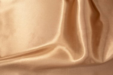 Arka plan için doğal altın kumaş dokusu. Lüks tuval arkaplanı.