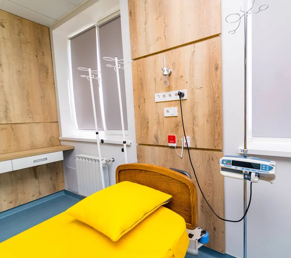 Modern empty hospital room. Interior of emergency clinical recovery room.