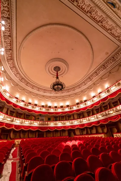 stock image View of an empty theatre with red seats and balcony. An old theater auditorium, interior