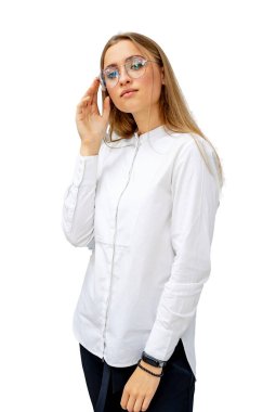 Young woman is wearing glasses isolated on white background. Eyesight correction. Ophthalmologist concept.