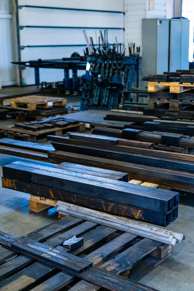 Storage for metal factory. Metalworking factory equipment.