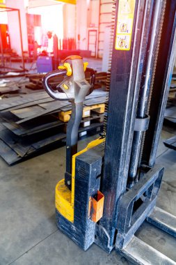 Warehouse storage logistics. Factory industrial transporter.