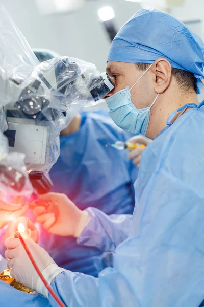 Medical surgery specialists. Modern neurosurgery doctors operating in hospital.
