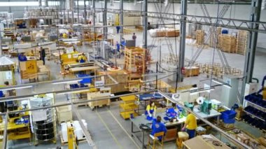 Background of workers in factory. Factory workshop interior and machines