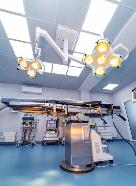 Sterile empty emergency modern room. New technologies surgery equipment.