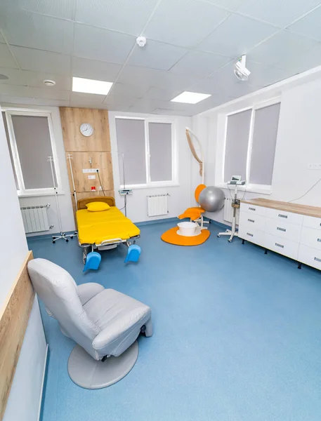 Recovery room with comfortable medical beds. Interior of an empty hospital recovery room.