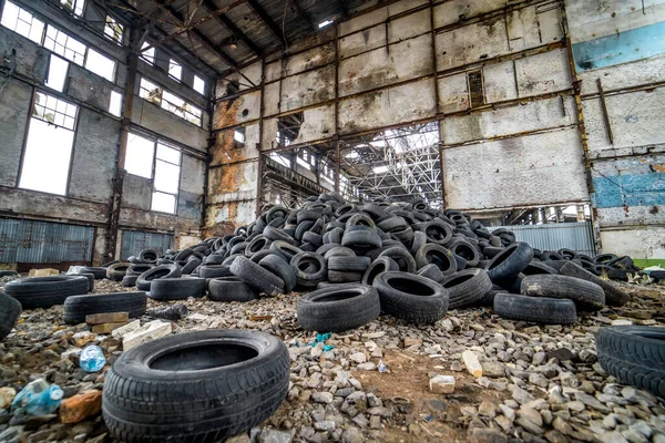 Trash of old automobile tires. Old tires grabage xtorage.