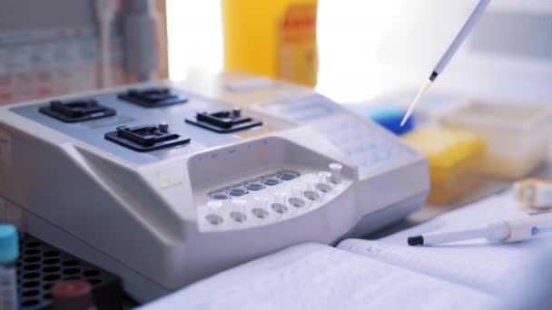 Technicians Operating Machine Laboratory Modern Electronic Blood Equipment Medical Clinic — Stock Video
