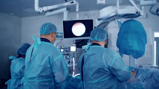 Chirurgischer Eingriff Operationssaal Medizinisches Team Bei Der Durchführung Einer Operation — Stockvideo