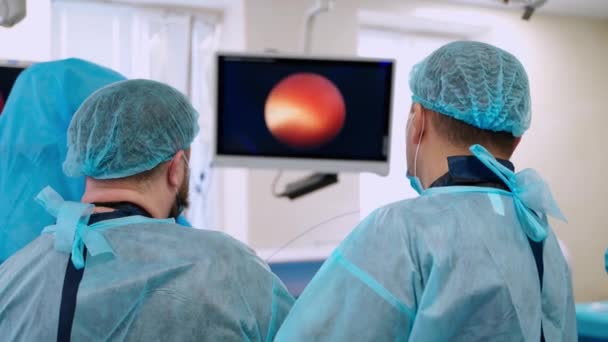Laparoskopische Operation Der Klinik Rückansicht Von Chirurgen Operationssaal Fachärzte Führen — Stockvideo