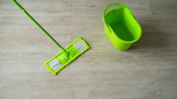 Cleaning Parquet Floor Wet Mop Green Brush Bucket Wooden Floor — Stock Video