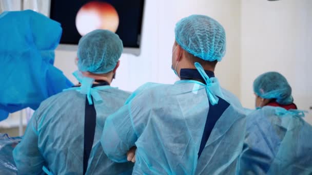 Gruppe Von Chirurgen Operationssaal Mit Operationsausrüstung Moderne Ausstattung Operationssaal — Stockvideo