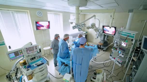 Cirugía Moderna Grupo Médicos Con Uniforme Médico Quirófano Hospital Trabajadores — Vídeos de Stock