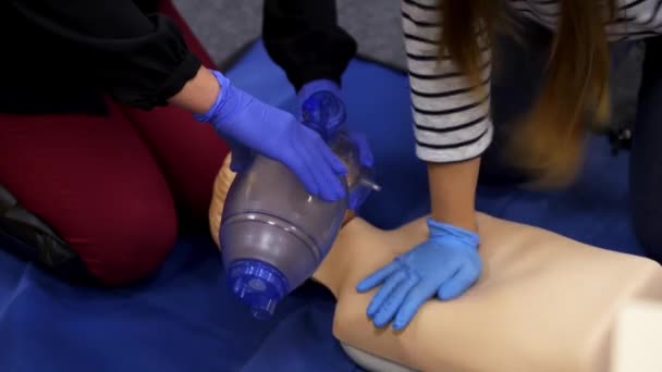 Cardiopulmonary Reanimation Training Course Giving First Aid Dummy Medical Demonstration — Stock Video