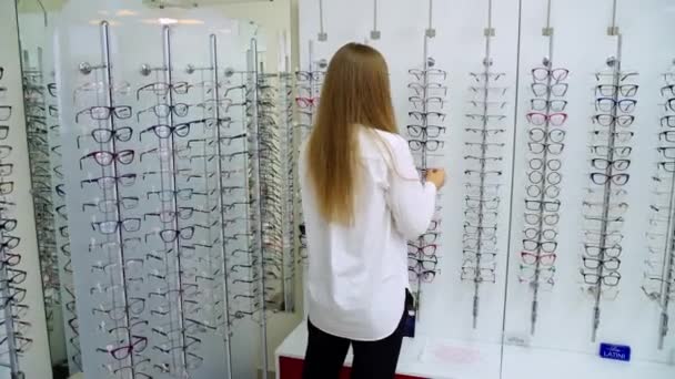 Woman Taking Glasses Woman Choosing Glasses Optics Store — Stock Video
