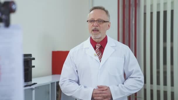Professional Physician Talking Camera Head Shot Portrait Doctor Talking Online — Stock Video