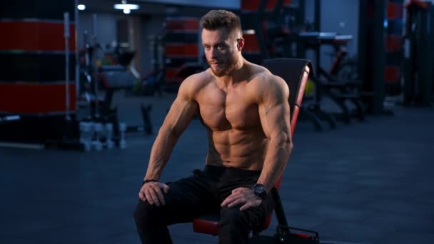 Handsome Athletic Man Rests Heavy Training Gym Modern Fitness Gym — Stock Video