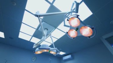 Hastanedeki ameliyathanede lamba. Ameliyat odasındaki cerrahi lambalar seçici renk tekniği ve sanat ışıklandırmasıyla çekiliyor.