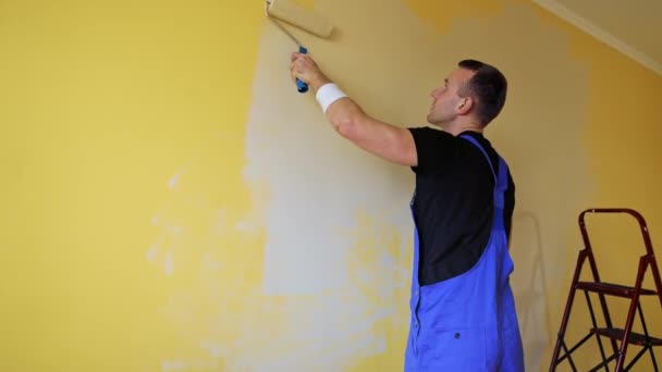 Man Roller Painting Wall Young Professional Male Painting Wall New — Stock Video